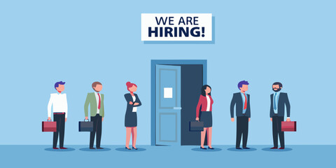 Diverse group of professionals waiting for job interviews under a hiring sign