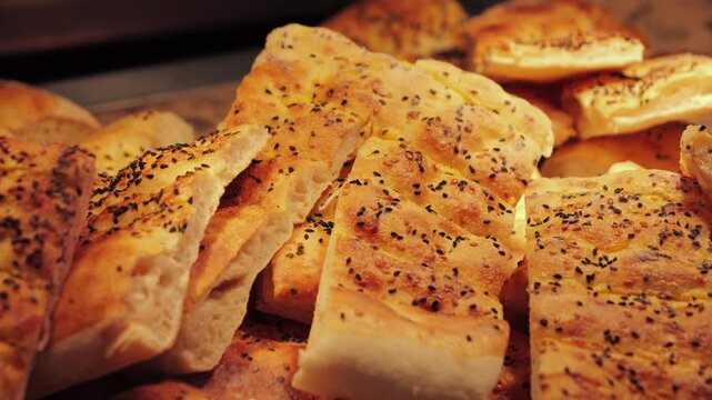 Freshly Turkish baked flatbreads Pide from a local bakery. High quality 4k footage