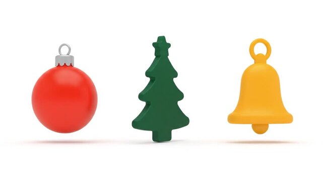 Festive christmas ornaments including a red bauble green tree and yellow bell