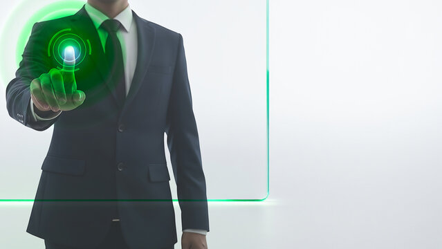 Businessman in suit using futuristic touch screen technology display interface