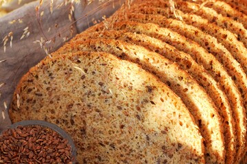 Freshly baked bread made from whole grain flour and flaxseed. Healthy eating concept.