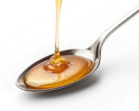 Honey pouring into a spoon - Powered by Adobe