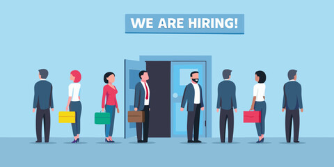 Diverse group of people waiting in line for job interviews