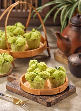 Bolu Kukus Pandan. Pandan cake blooms, very soft with a distinctive pandan aroma
