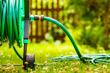 Garden hose for watering plants in garden