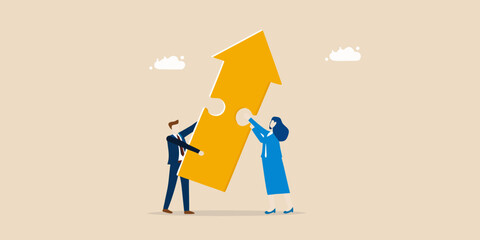 Business partners assembling an upward trending arrow puzzle piece for growth
