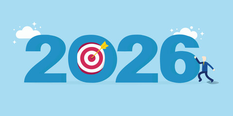 Businessman reaching for 2026 goals with target and arrow