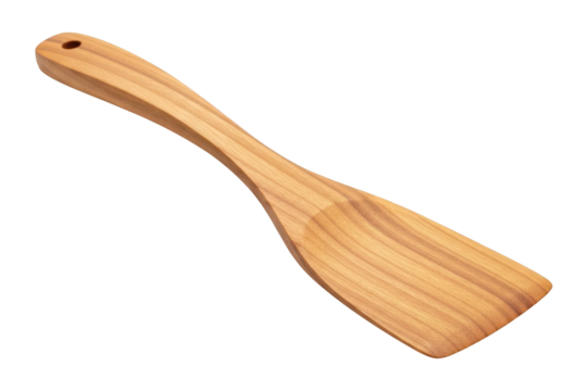 Slanted wooden cooking utensil rests against a dark background