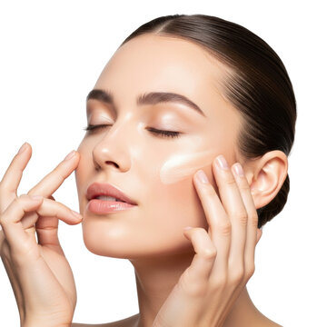 Woman Applying Skincare Cream on Her Face with Soft Glow Effect