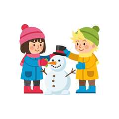 Fototapeta premium Children building snowman together in winter season.