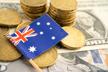 Australia flag on coin and banknote money, finance trading investment business currency.