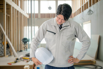 つらそうな作業員