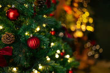 Beautifully illuminated Christmas decoration with sparkling lights, Christmas trees, stars, teddy bears and presents.	