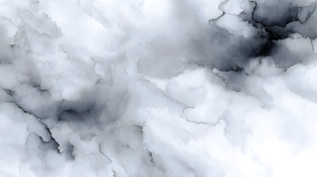 Abstract monochrome background created with wet ink washes on textured watercolor paper featuring fluid patterns and subtle gradients perfect for ic designs