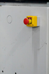 Close up view of an emergency stop push button.