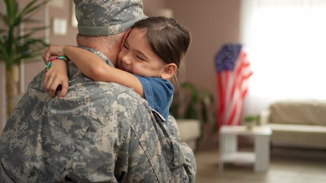 Soldier returning home hugging child with love