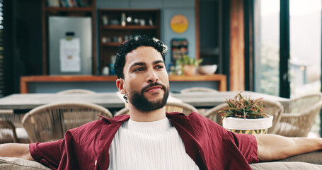 Chilling, relax and thinking with man on sofa in living room of home for me time or wellness. Idea,...