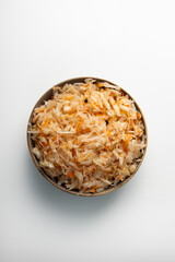 Fermented cabbage with carrot in bowl sauerkraut top view