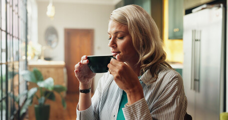 Coffee, thinking and woman in home in morning for calm, peace and relax on weekend in living room. Memory, ideas and female person smelling caffeine aroma for break with reflection in apartment.