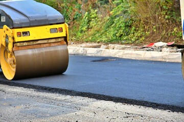 repairing asphalt road, municipal theme