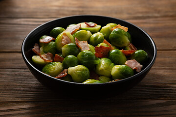 Close up of Baked brussels sprouts in bowl winter vegetables  rustic surface