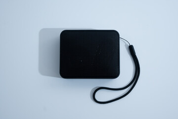 Compact Black Bluetooth Speaker with Strap