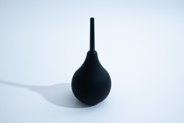 Black Rubber Enema Bulb on White Background