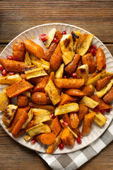 Roasted vegetables set roots on plate comfort food