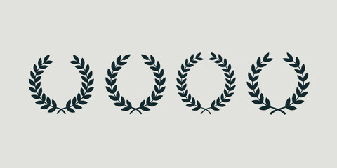 Four black laurel wreaths on a light background