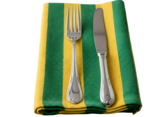 Silver fork and knife on a green and white striped napkin isolated on transparent background