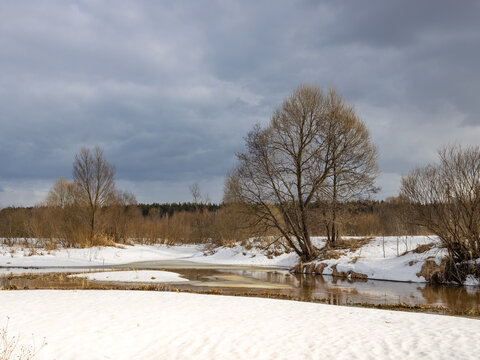 Snowy landscape with a river and trees - Powered by Adobe