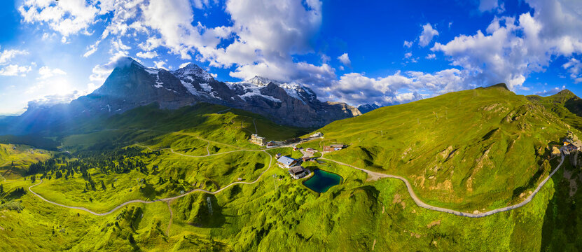 Switzerland travel. beautiful Swiss nature . Kleine Scheidegg mountain pass and train station that runs between the famous Eiger and the Lauberhorn famous for hiking in Bernese Alps.