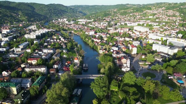 Cinematic aerial video of river Vrbas flowing through Banja Luka, one of the most populous cities in Bosnia and Herzegovina.