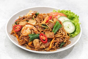 Mie Goreng Mamak is a typical Malaysian dish which is famous for its rich and appetizing taste