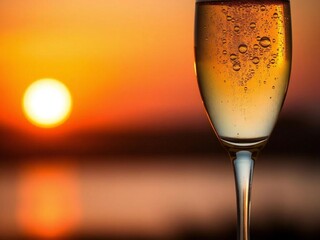 glass of champagne on black background