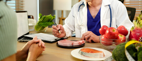 The healthcare professional providing nutritional guidance to a patient, developing healthy diet, dietary program. \