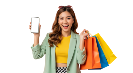 Excited Asian woman holding shopping bags and showing mobile phone with blank screen isolated on black background presenting promotional content or sale offers 