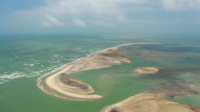 A group of islands and shoals connecting Sri Lanka and India. Adam's Bridge.