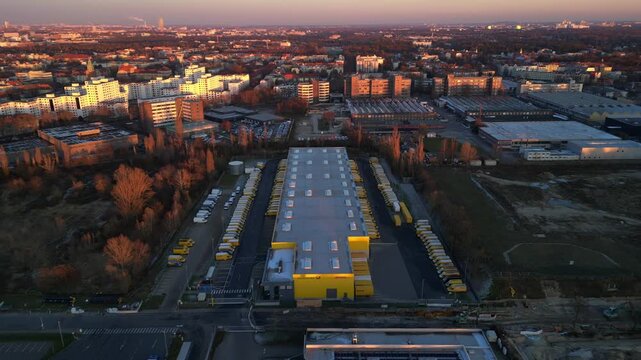 Long yellow DHL distribution center Berlin. Nice aerial view flight drone