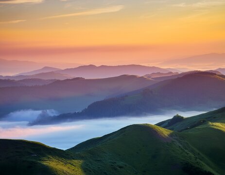 mountain range vista at sunrise rolling hills fog and sky with soft colors