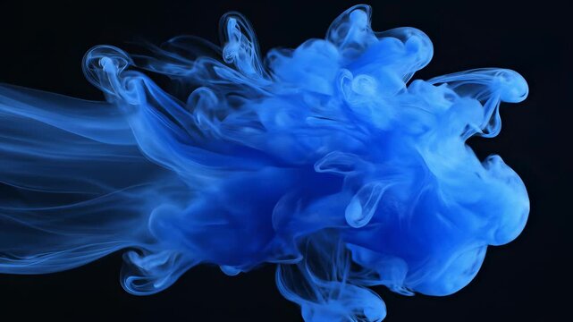 Blue ink swirls amidst wisps of smoke on a dark background, conveying refinement and sophistication, inviting viewers to step into a world of understated luxury and serenity.