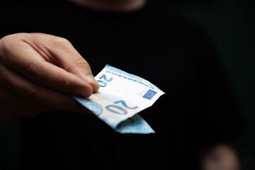 Hand Holding Twenty Euro Note Payment Transaction