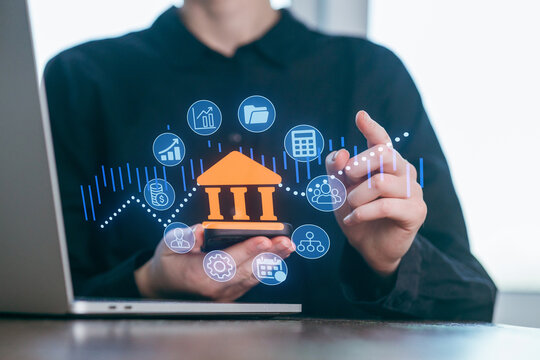 Digital banking trends and innovation presented by a professional in a modern office setting with tech graphics on display