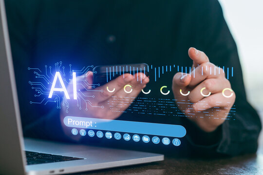 Person using smartphone and laptop to interact with artificial intelligence technology in a modern workspace