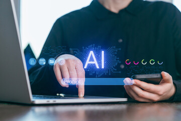 Person interacts with laptop and smartphone while exploring artificial intelligence technology in a modern workspace