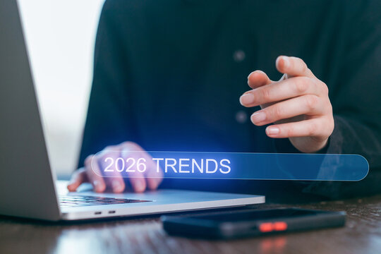 Exploring future insights and trends for 2026 during a focused work session at a modern workspace