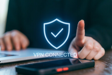 Using a laptop and smartphone to confirm VPN connection for online security