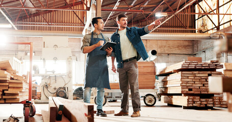 Carpentry, planning and men on tablet in workshop for meeting, construction and woodworking. Carpenter team, pointing and people on digital tech for online inventory for timber, lumber or instruction