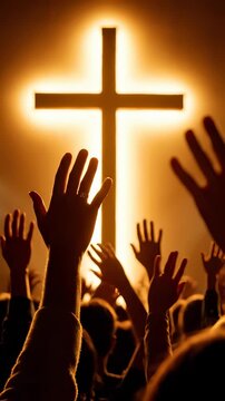 Spiritual gathering with hands raised towards cross. People express faith and devotion in uplifting atmosphere. Worship event captures community and connection.
