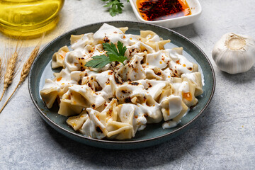 Traditional Turkish dish manti. Traditional dish made with handmade dough and minced meat.